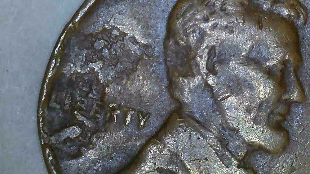 1945 P lincoln penny with lamination error.