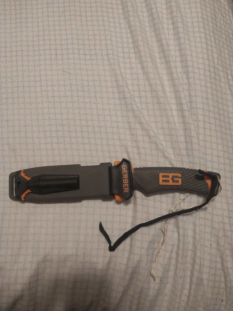 Gerber Bear Grylls Ultimate Survival Knife with firestarter.
