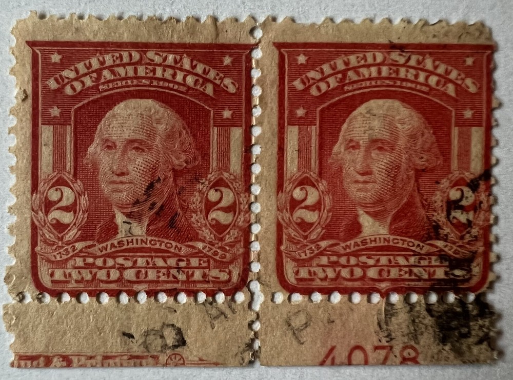 ERROR U.S. 2C STAMP PAIR WITH MISPERF AND PLATE NUMBER CUT IN HALF