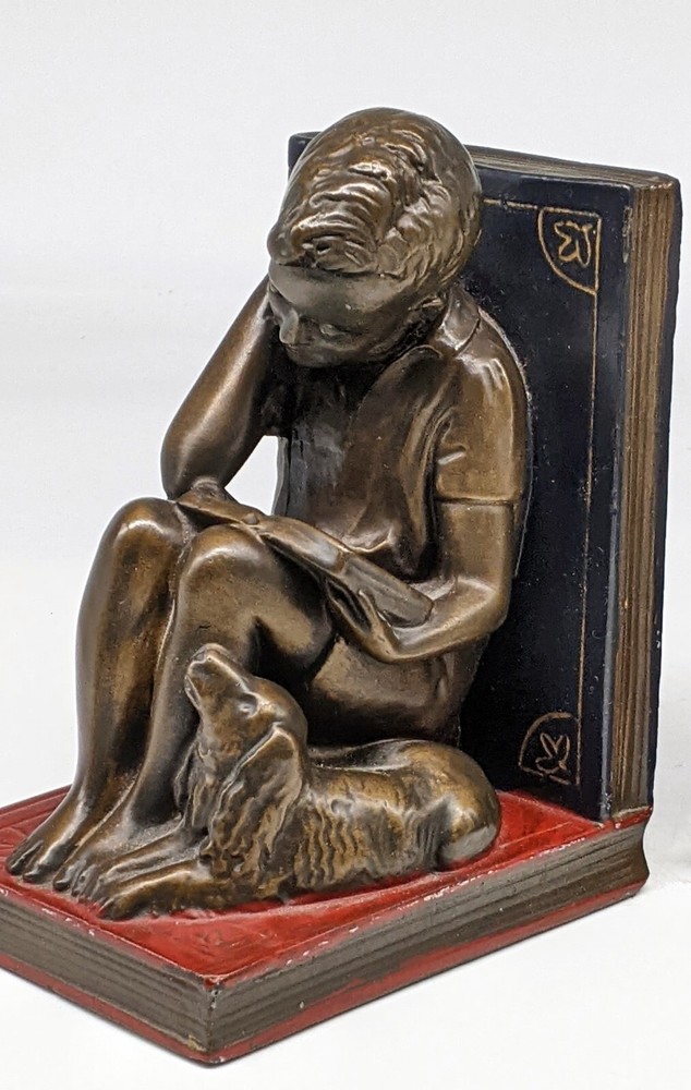 Boy reading with Dog Bookends heavy !