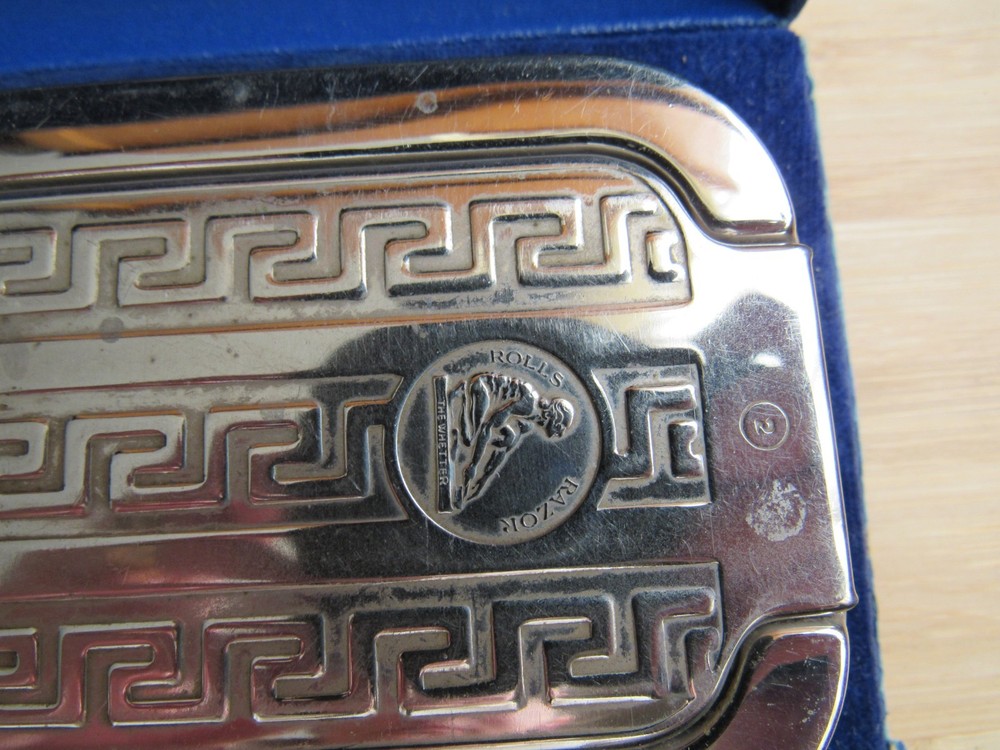 Antique Rolls Razor