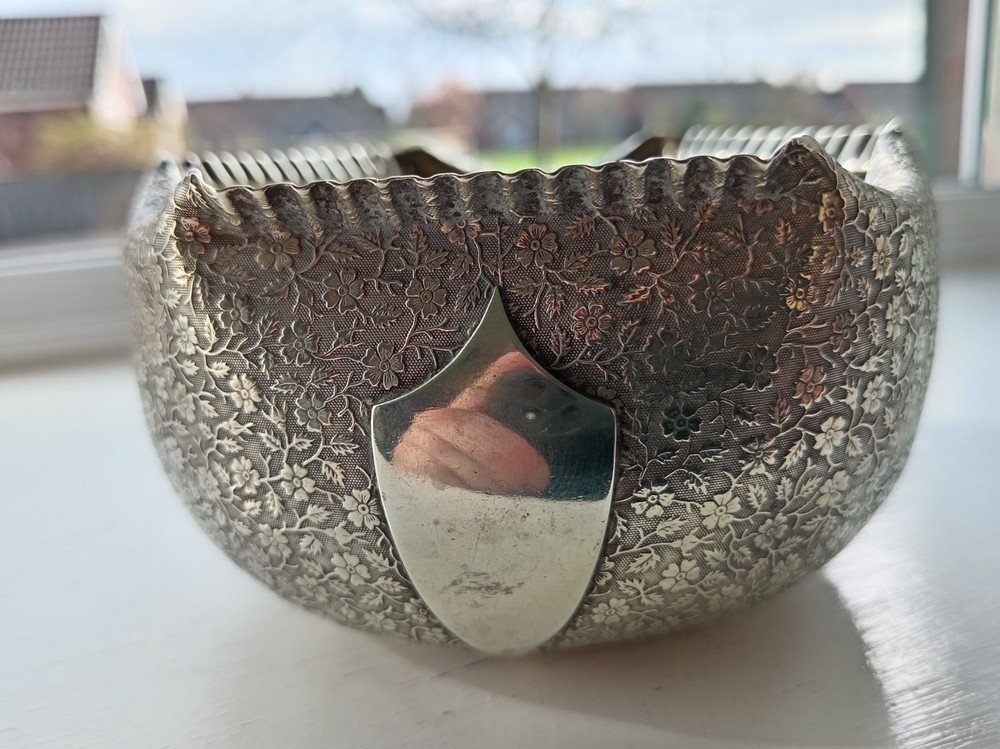Silver plated very ornate rose bowl.