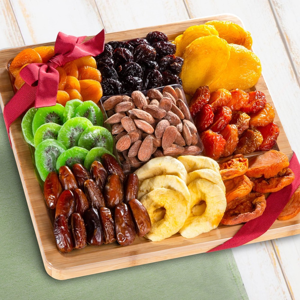 Dried Fruit Assortment with Almonds on Cutting Board Serving Tray