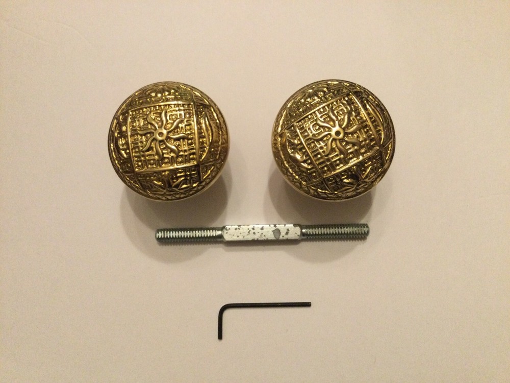 Pair Of Antique Looking Brass Embossed Door Knobs