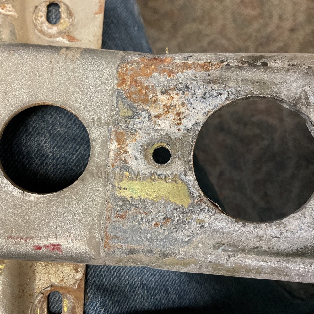 PETERBILT HOOD BRIDGE BRACKET - 13-04757