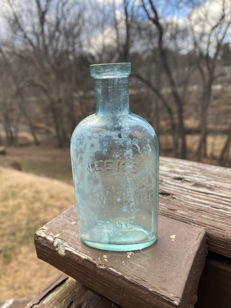 Week’s Snow Flake Blue Antique Bottle