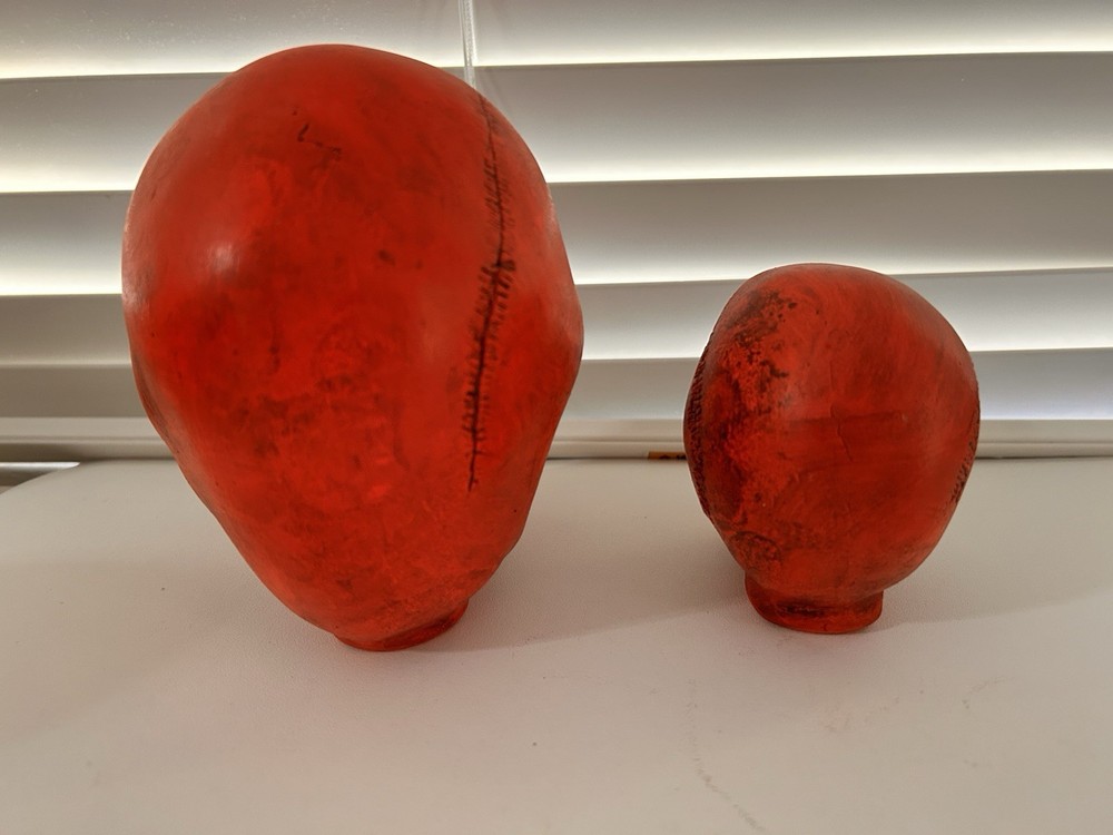 2 EA. RANDOTTI ORIGINAL LARGE & MEDIUM FLUORESCENT RED SKULLS STILL GLOW