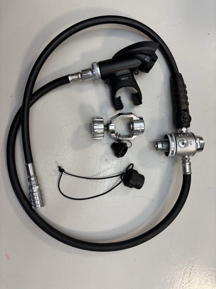 Poseidon  first and second stage scuba regulator fits both yoke and DIN.
