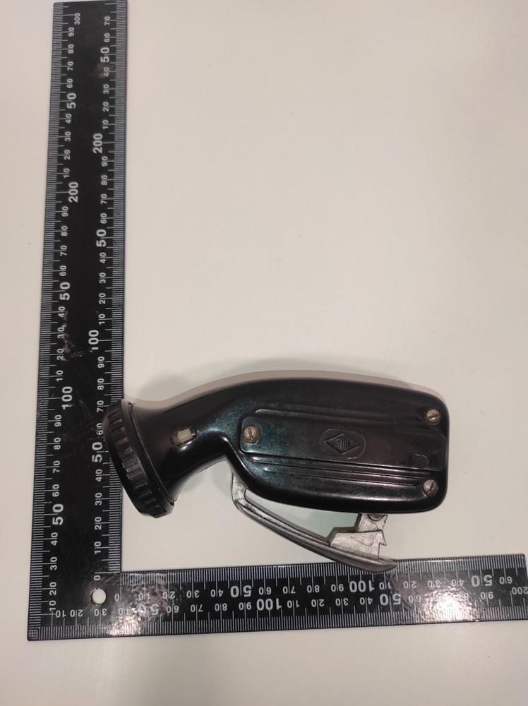 Soviet electrodynamic flashlight called "Zhuchok." "B-44."