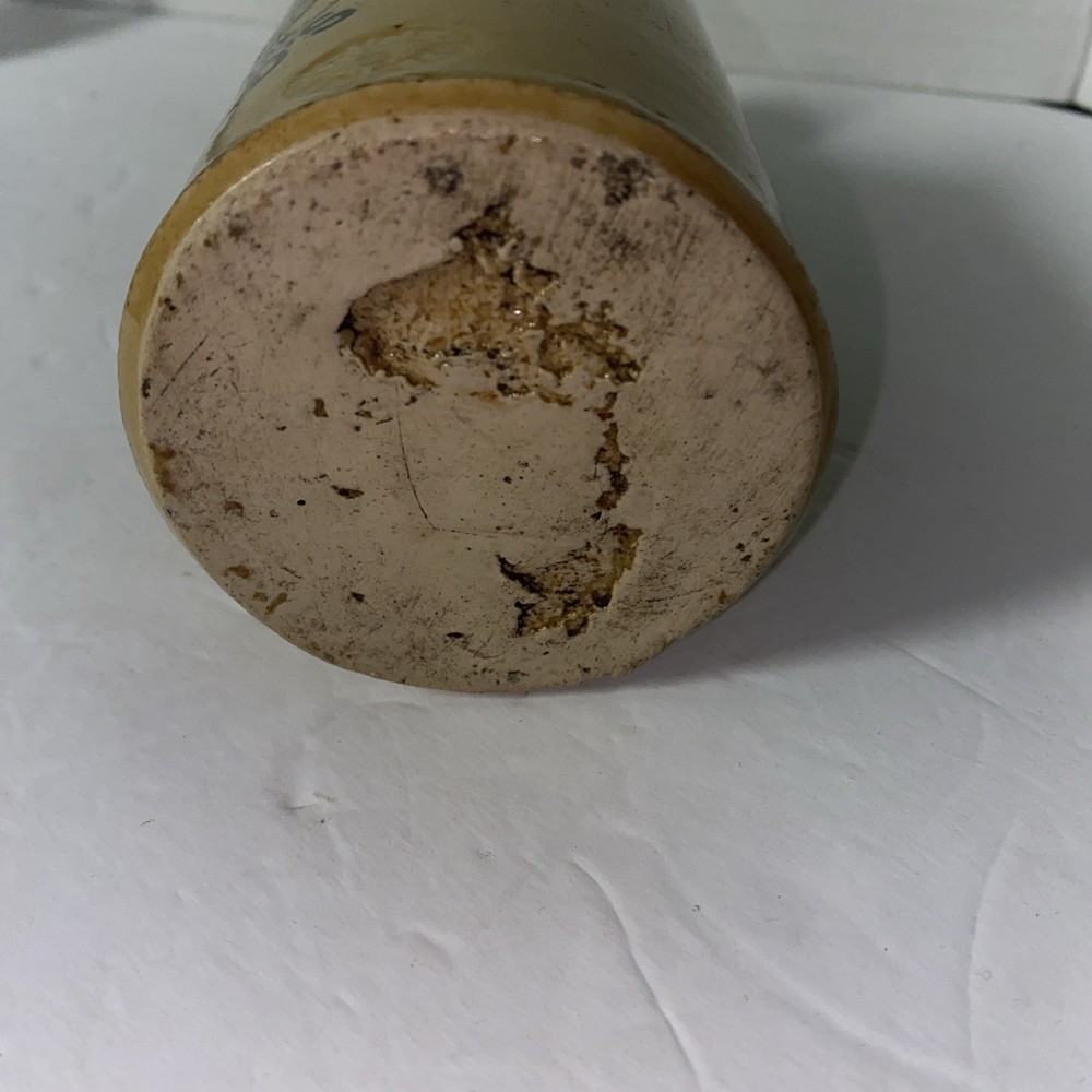 Vintage wight pebble waters stoneware bottle
