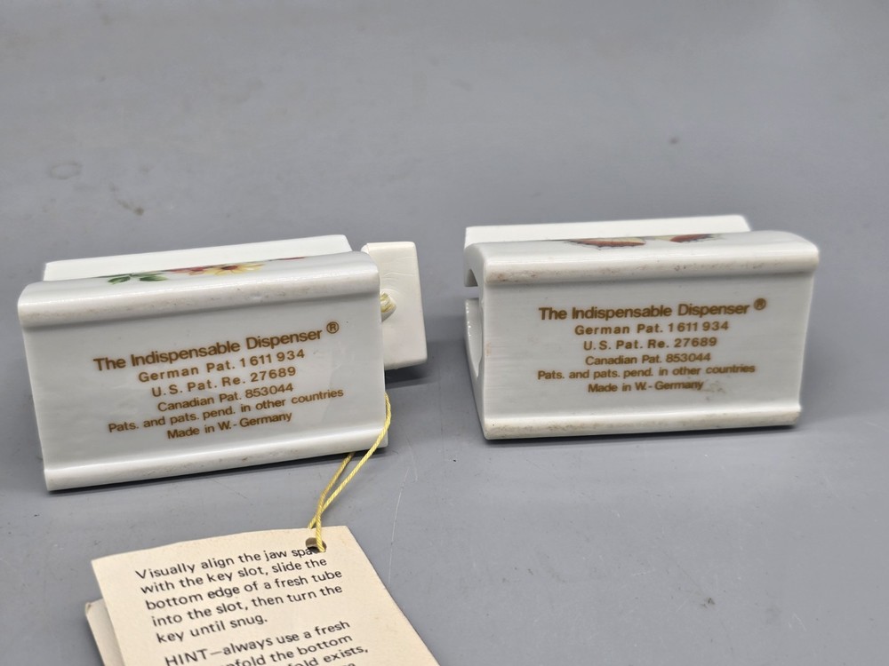 NOS Indispensable Dispenser Toothpaste Tube Roller Pair Flower Moth