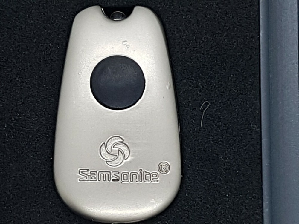 Samsonite Laser Pointer with tracking number