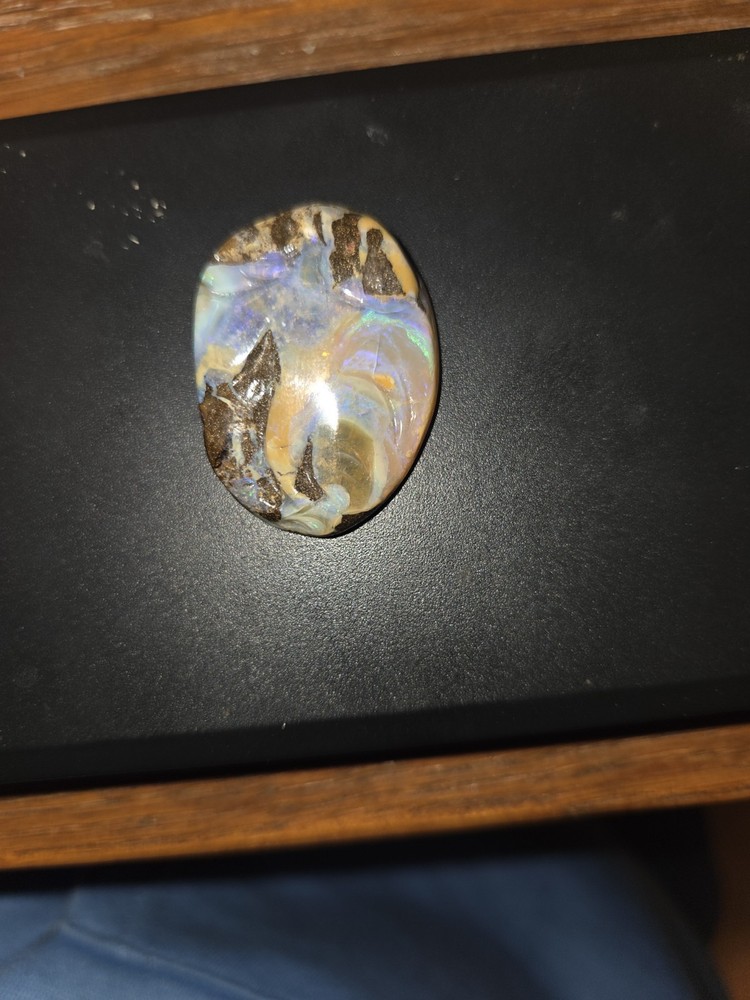 Carved Boulder Opal Stone