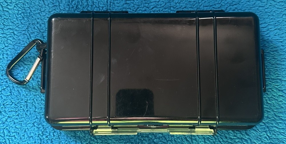 Pelican ™ 1060 Solid Black Micro Case includes Rubber Cushion Insert