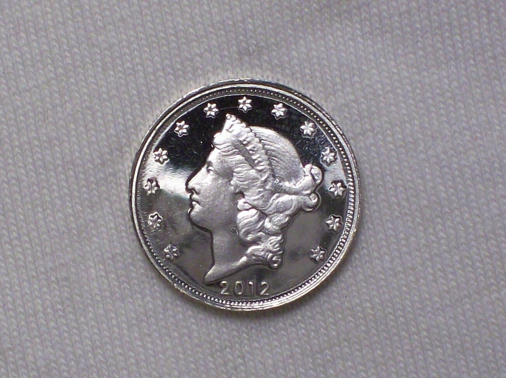 Daniel Carr - 2012 Liberty - Eagle-Head - 1/20 Troy Oz. Silver - Smooth Edge