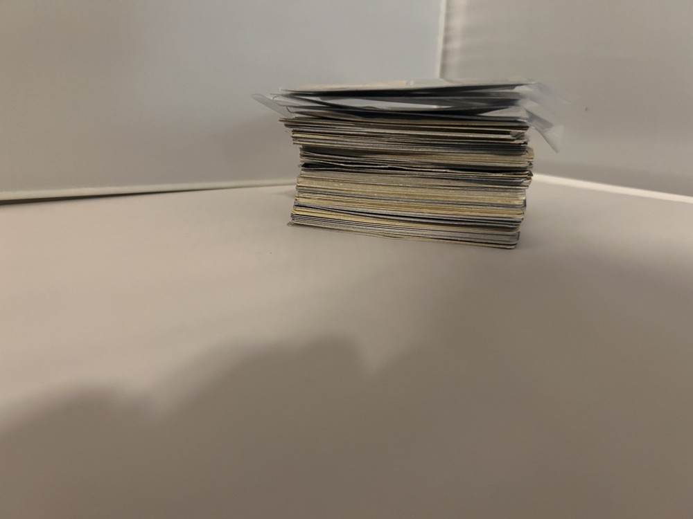 Unsorted assortment of 100 Pokémon cards ￼-all basic cards-￼