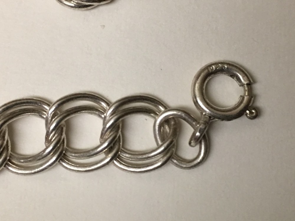 CHARM STERLING BRACLET 7 INCHES