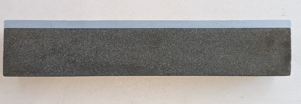 Vintage sharpening stone maybe natural stone , used