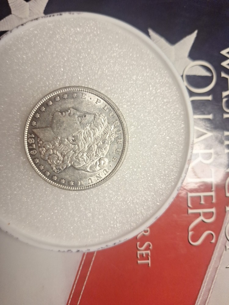 #21-1879 $1 Morgan Silver Dollar