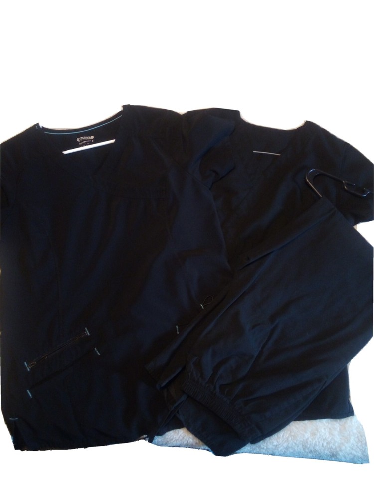Women's size small scrubs. Black two sets