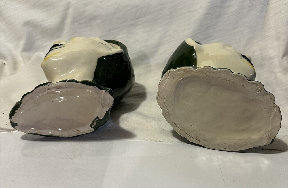 2 ceramic Jester planters.