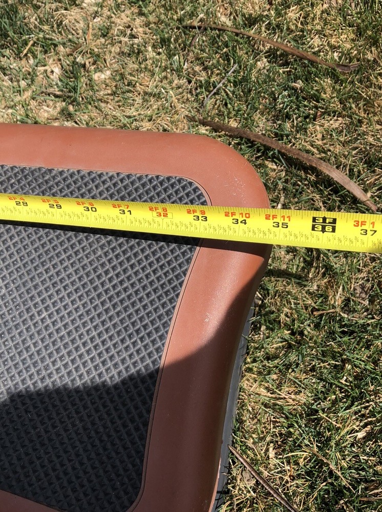 hot tub / spa steps in rust colored plastic..