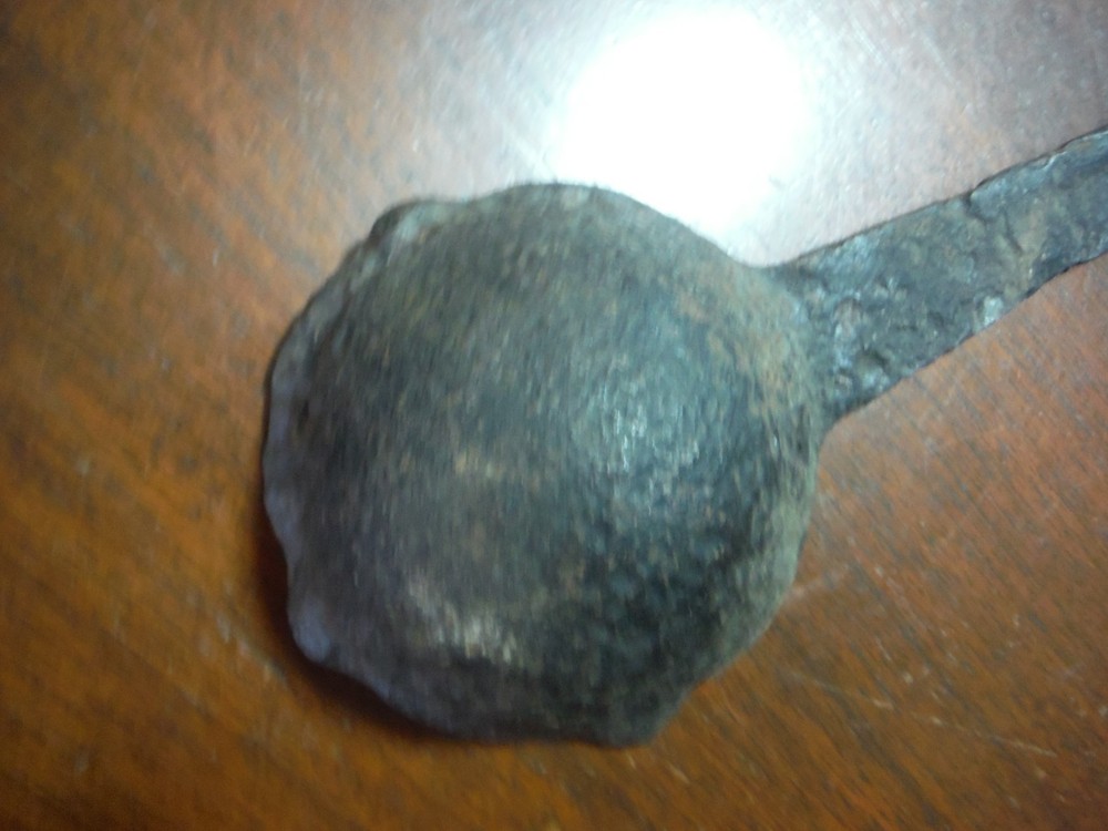 vintage huge metal spoon