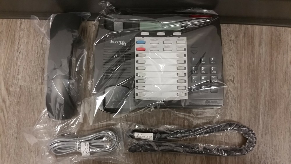 New Mitel 4025 office display phone