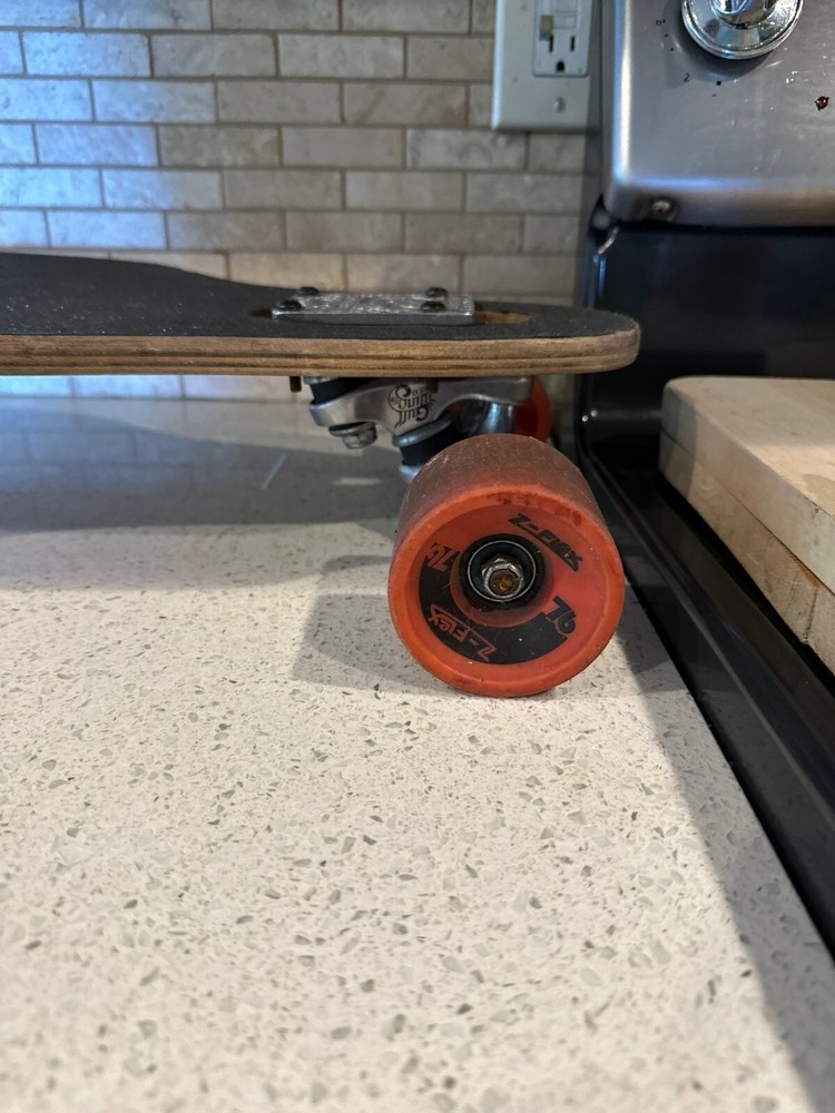 Catalyst longboard with gull wing trucks