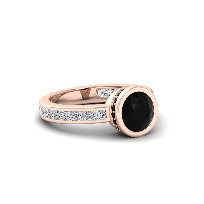 Make a statement with this stunning rose gold ring featuring a round black gemst