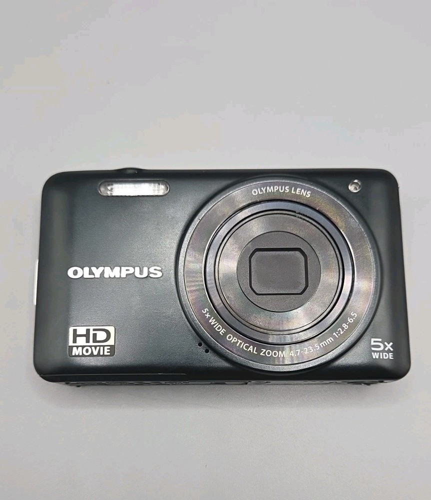 Olympus D-745 Digital Camera And Charging Lead, Black.