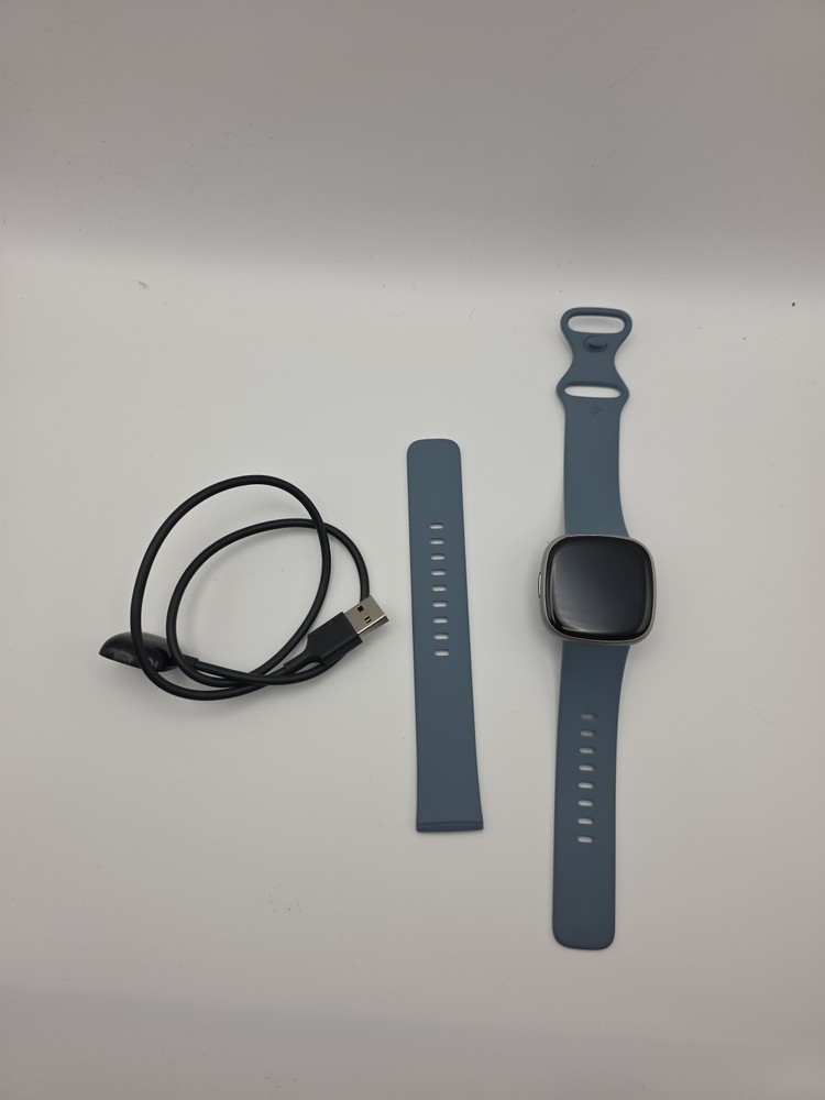 Fitbit Versa 4 Activity Tracker - Waterfall Blue/Platinum Aluminum