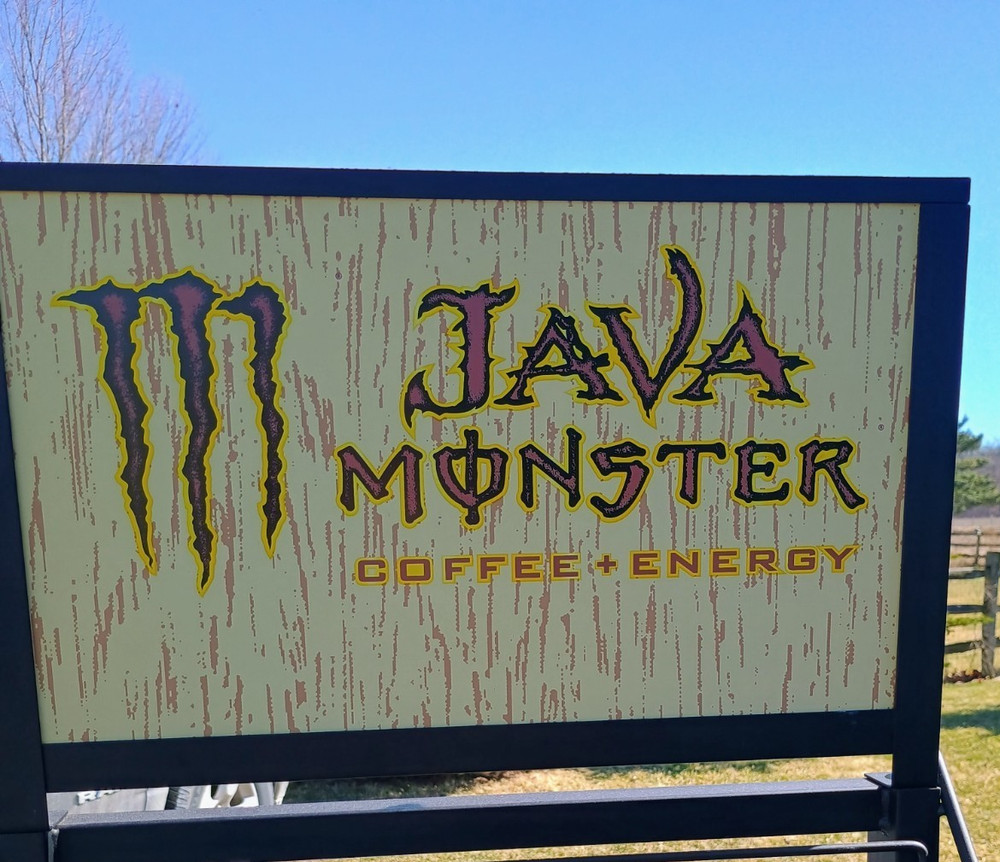 Monster Energy drinks display shelf on wheels that lock and with inserts