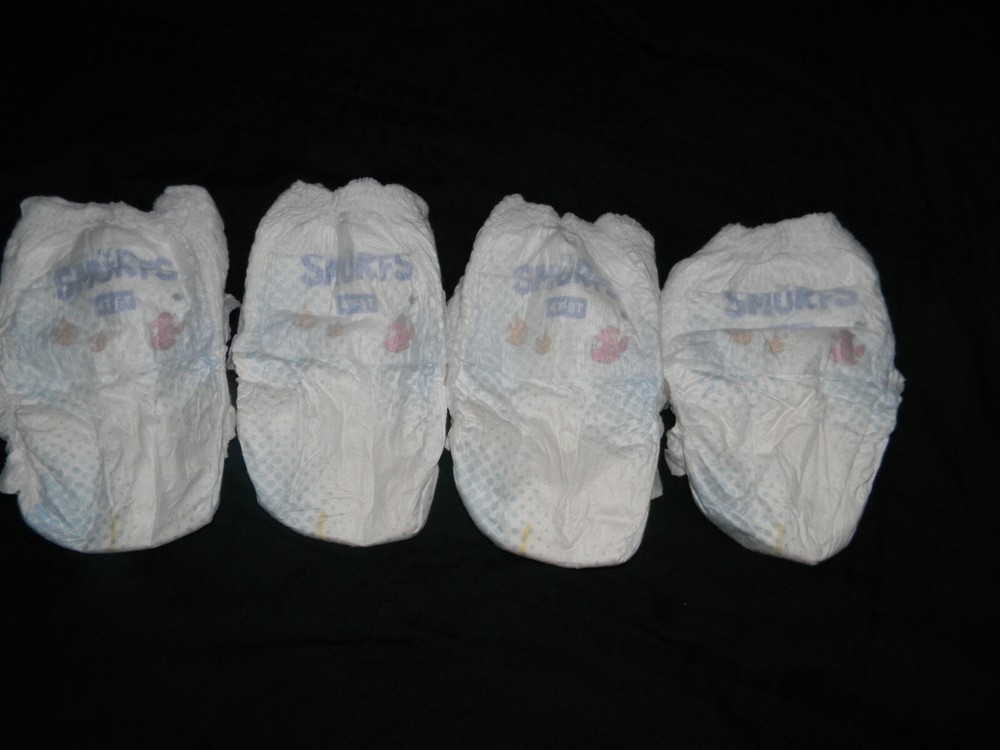 4 sample Smurftastic training pants 4T-5T over 38. Lbs.