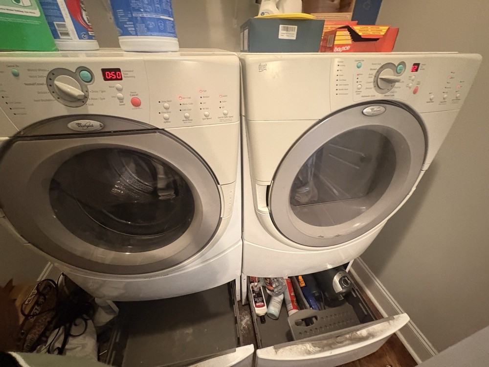 Whirlpool Duet Front-Loading Electric Washer & Dryer Set White Window Display
