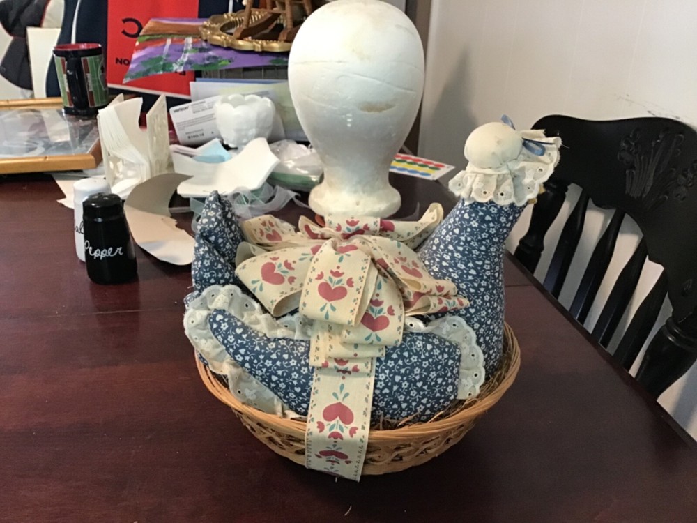 chicken pin cushion in a basket