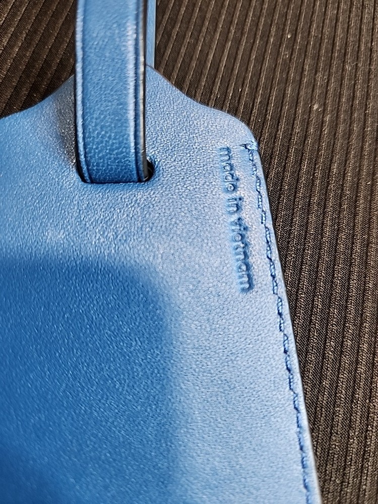 RARE! Coach luggage tag stegosaurus.