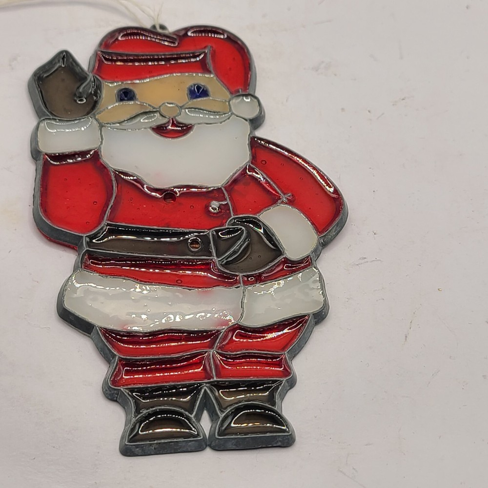 Santa sun catcher. Plastic with metal framing.