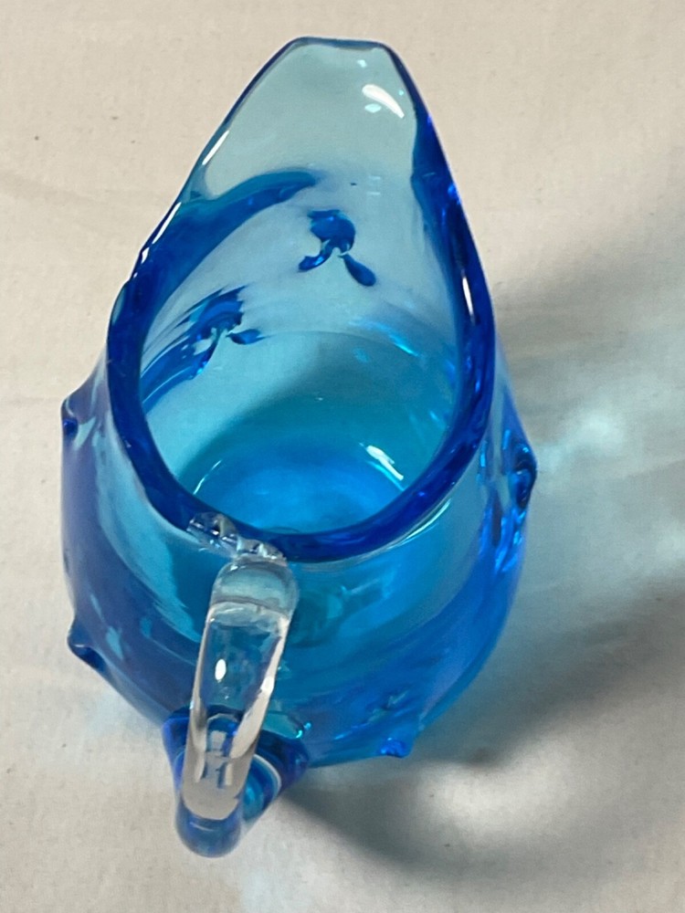 Art glass Light blue dimpled design creamer 3”