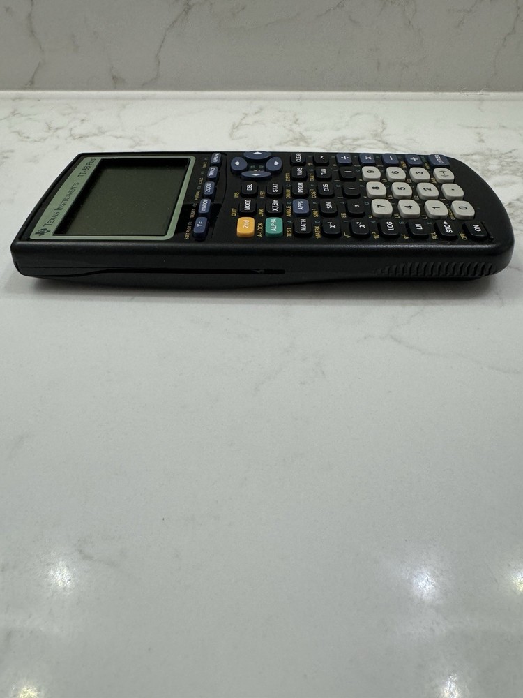 Texas Instruments TI-83 Handheld Graphing Calculator