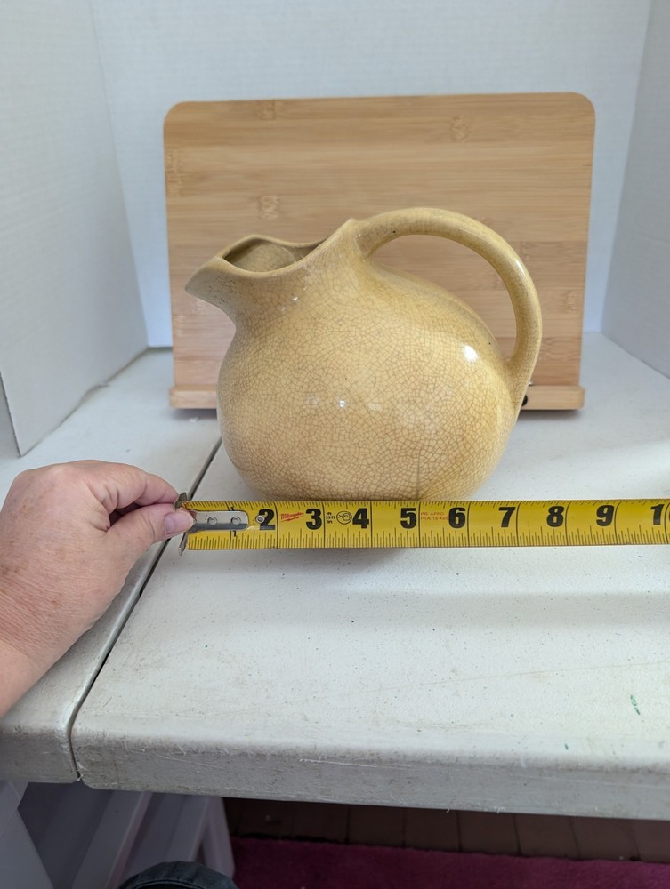 Vintage Yellow Tilted Ball Pitcher
