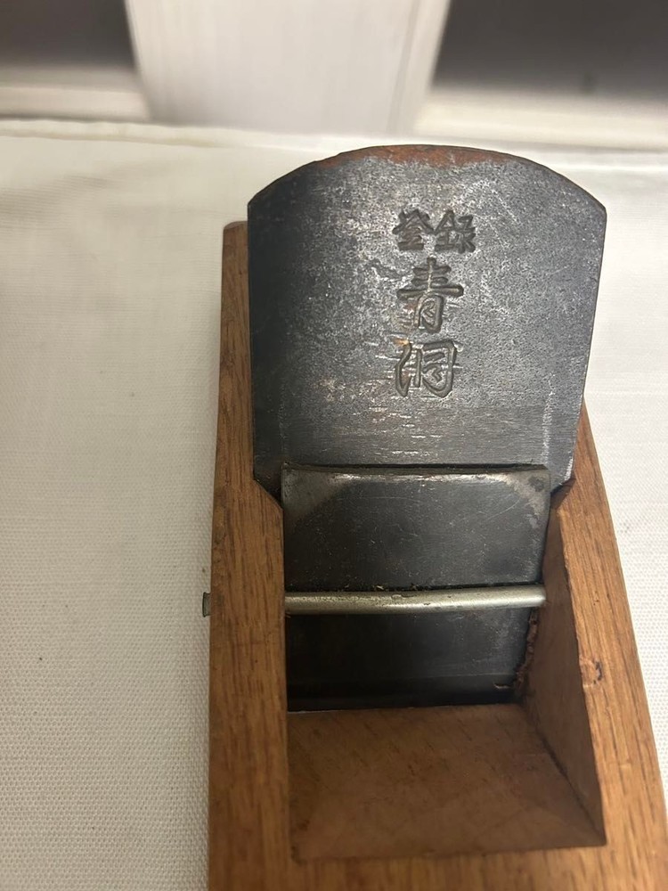 There are small stains and scratches.