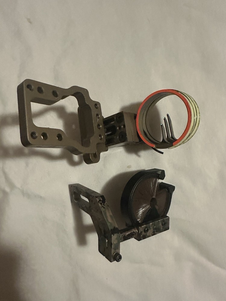 archery sight and arrow rest left