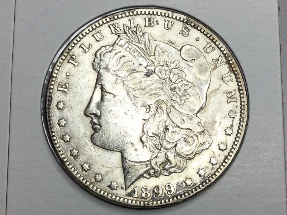 1899-O micro O Morgan Dollar in almost uncirculated
