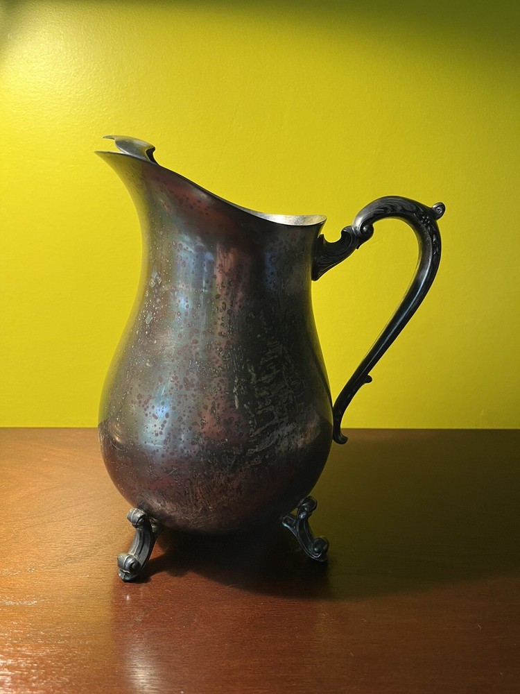 vintage silver soldered pitcher 9” tall