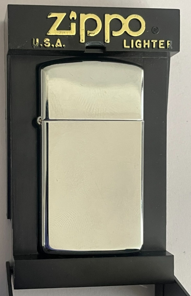 SLIM ZIPPO LIGHTER - 1999 High Polish Chrome UNFIRED Boxed