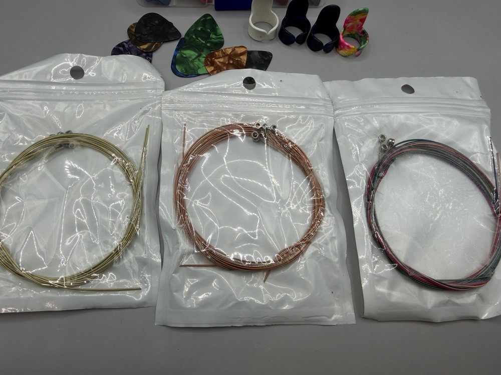 Guitar Lot - (2) Alice Capo, Alice Picks, Strings & More