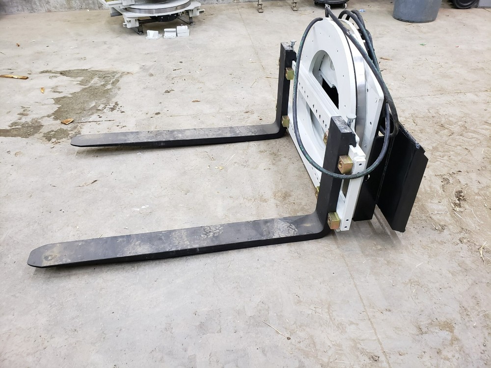 Skidsteer Bobcat fork rotator--- NEW WITH WARRANTY!!!