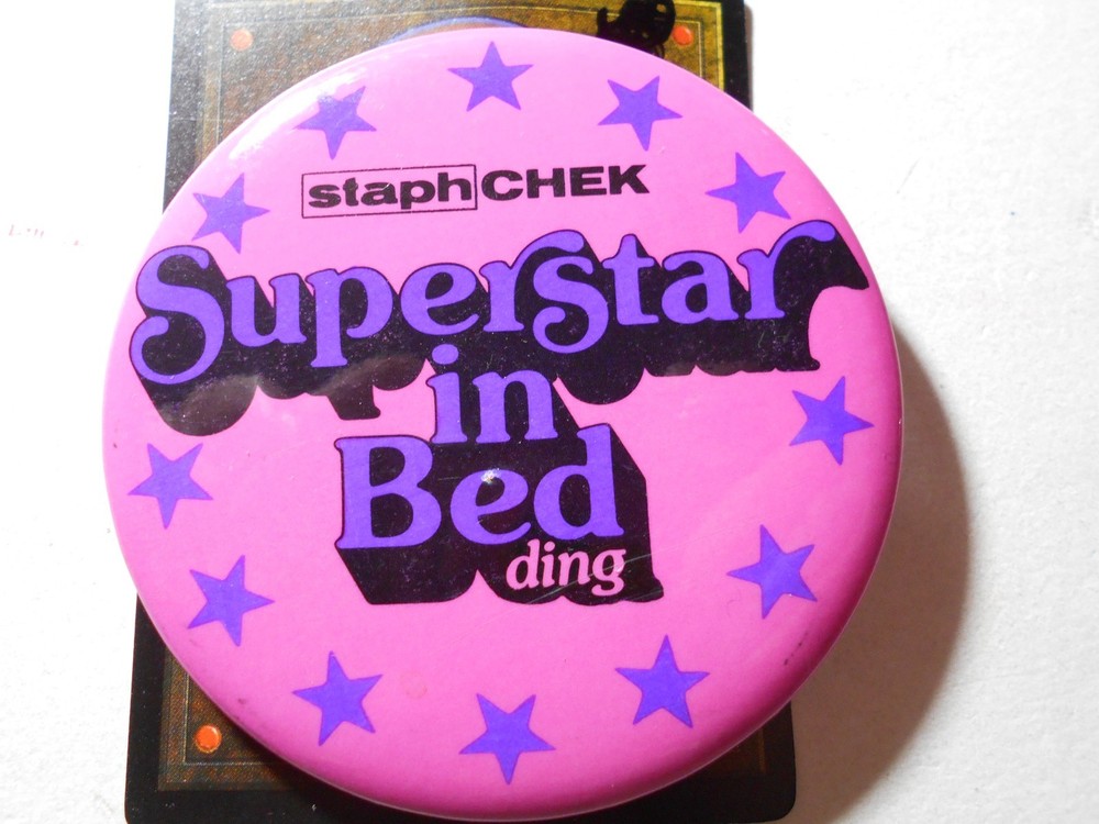 AD0264: StaphChek SuperStar in Bed(ding) 3" cello pinback button
