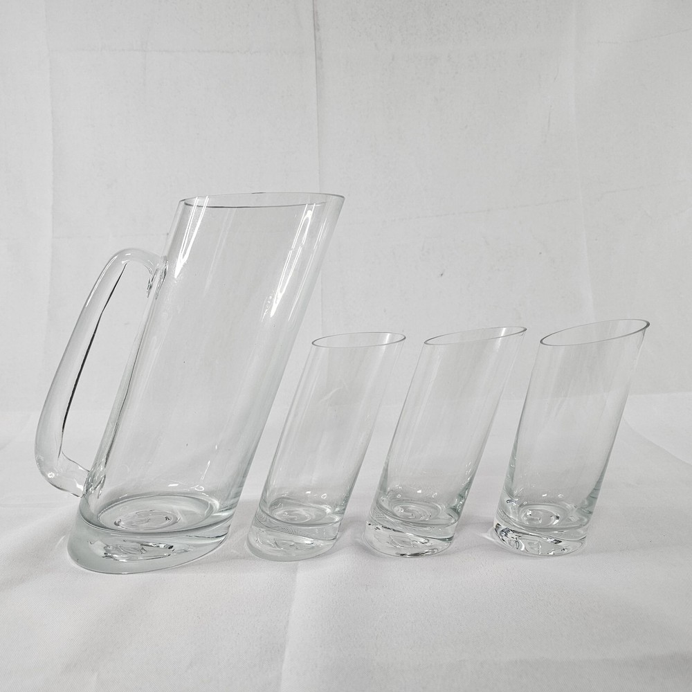 Clear Glass Tilted 9" Pitcher And 3 5.25" Glasses Please Read Description